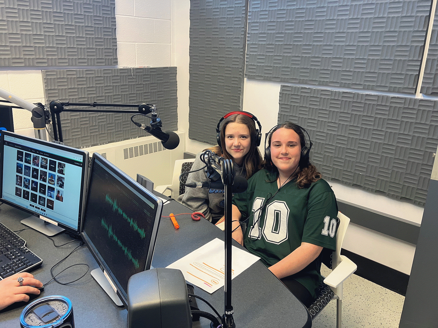 The winning duo, students Amy and Gabby, at Loyalist College’s 91X radio station to have their ad professionally recorded.