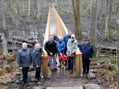 Gathering at one end of the new Hi-Lo Boardwalk at the H.R. Frink Conservation Area are, from left to right, Paul Carr, Belleville councillor; Bea Heissler, retired H.R. Frink educator; Brad McNevin, Quinte Conservation CAO; Peter Rhebergen, Ducon; Kathryn Brown, Belleville councillor; Douglas Moses, John M. and Bernice Parrott Foundation; Lyle Vanclief, John M. and Bernice Parrott Foundation; Terry Murphy, retired Quinte Conservation general manager. 