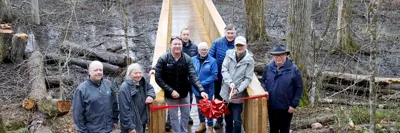 Gathering at one end of the new Hi-Lo Boardwalk at the H.R. Frink Conservation Area are, from left to right, Paul Carr, Belleville councillor; Bea Heissler, retired H.R. Frink educator; Brad McNevin, Quinte Conservation CAO; Peter Rhebergen, Ducon; Kathryn Brown, Belleville councillor; Douglas Moses, John M. and Bernice Parrott Foundation; Lyle Vanclief, John M. and Bernice Parrott Foundation; Terry Murphy, retired Quinte Conservation general manager.